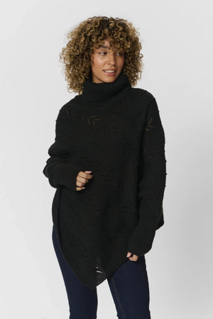 #holidayponchocapepitchblack