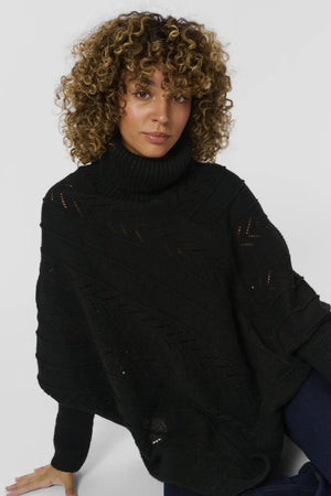 #holidayponchocapepitchblack